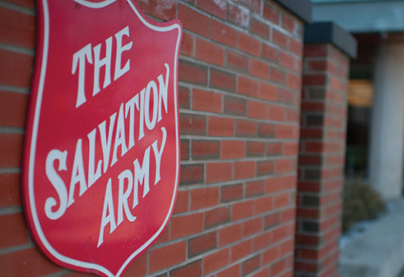 The Salvation Army logo at the wall